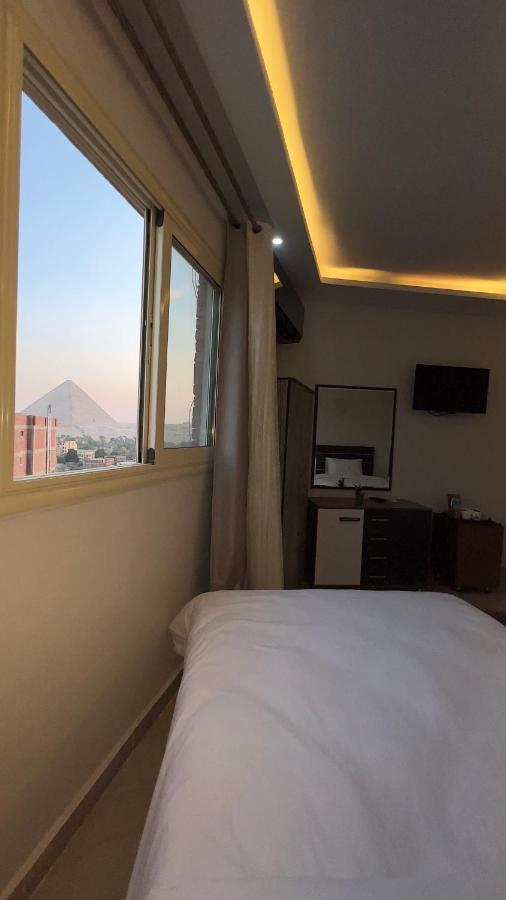 Pyramids Tower View Inn Nazlat as Sammān Exterior photo